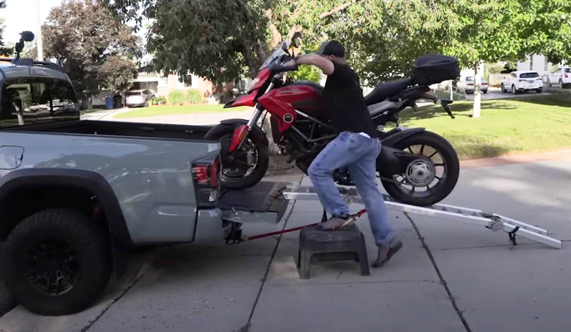 How to Load and Tie Down a Motorcycle Into a Truck