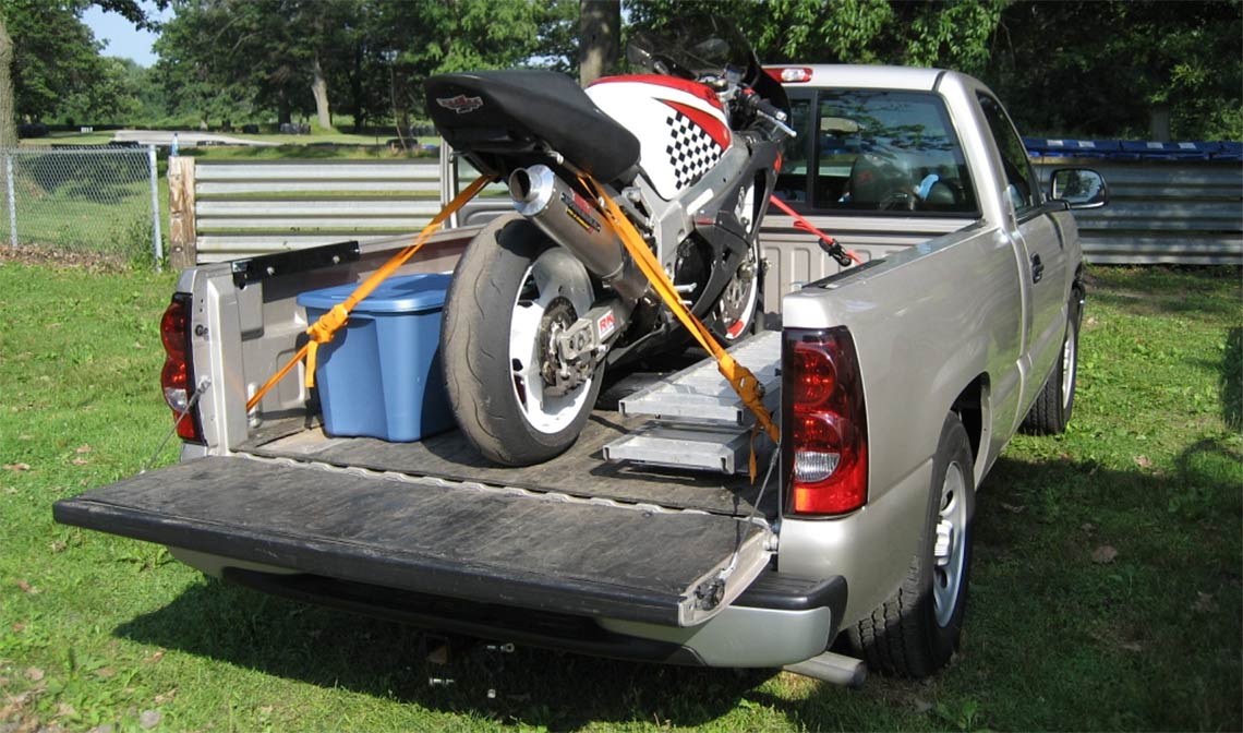 How to Load and Tie Down a Motorcycle Into a Truck